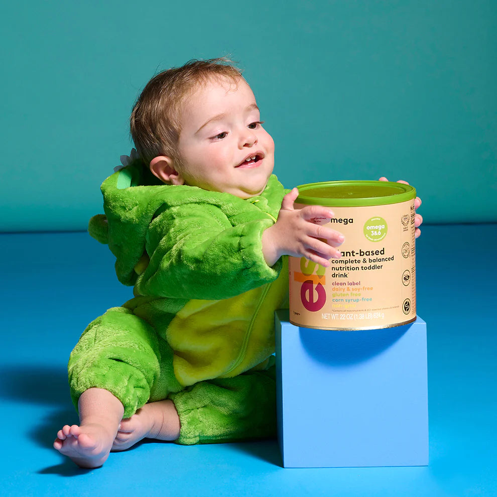 toddler reaching for toddler formula
