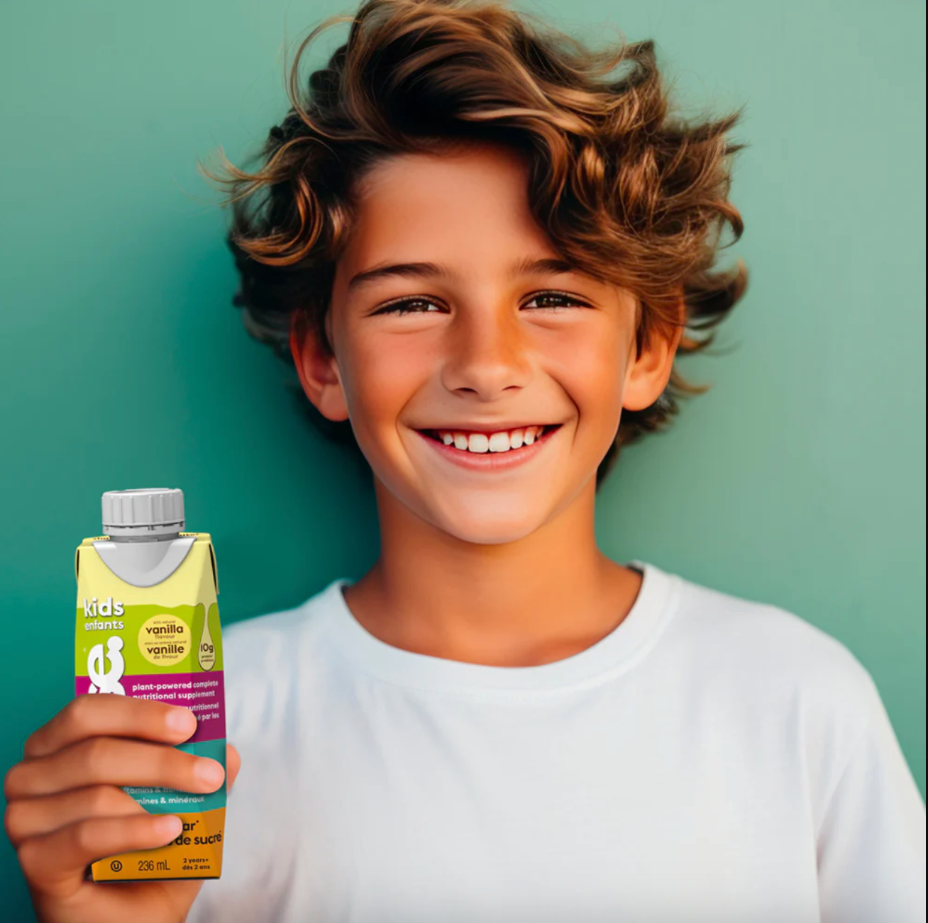 Kid keeps in hand ready-to-drink shake for kids